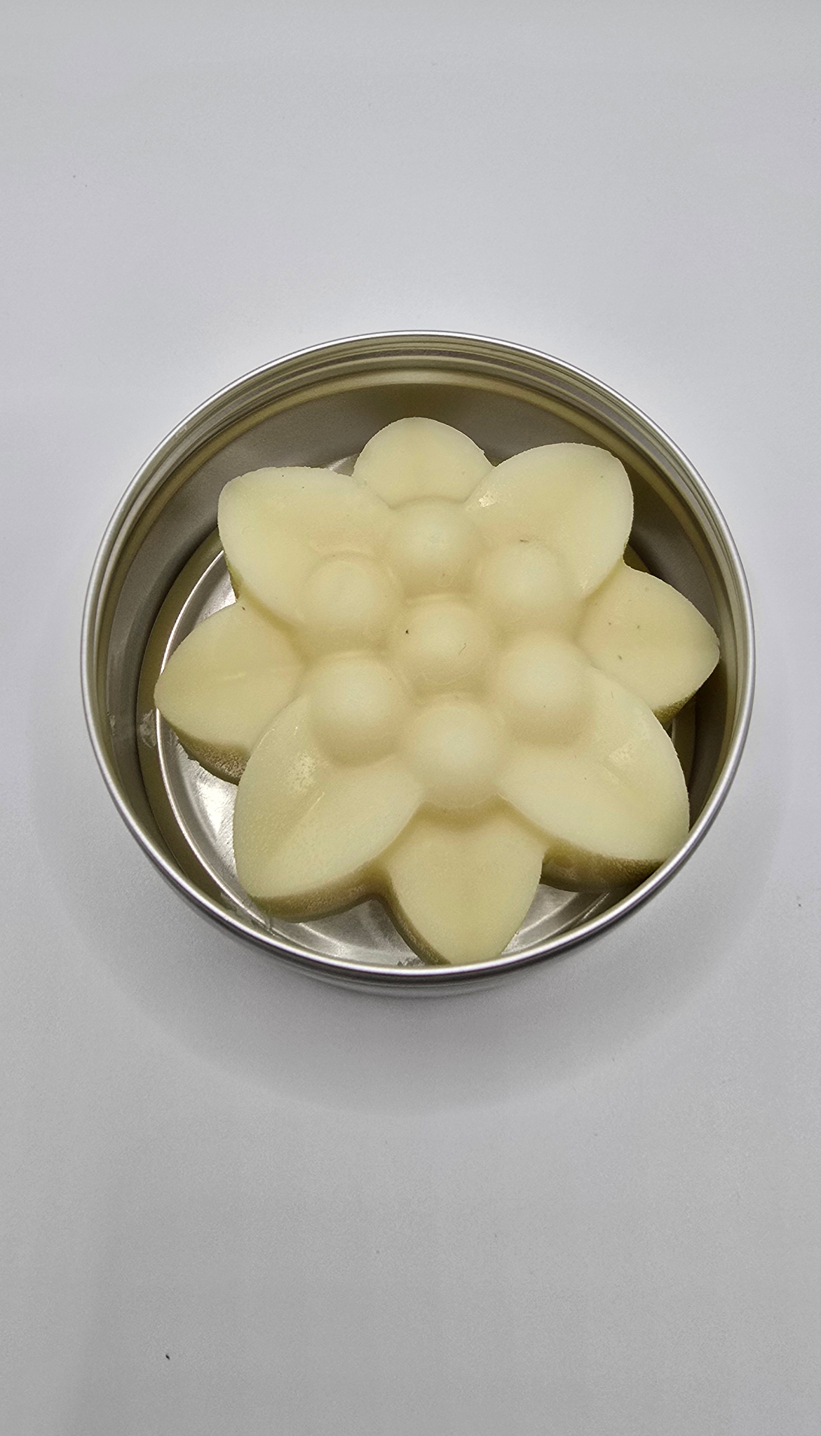 683f8647fae72e57618b2b3e_blue-lotus-lotion-bar-amber-official-photo_1751519859136.png