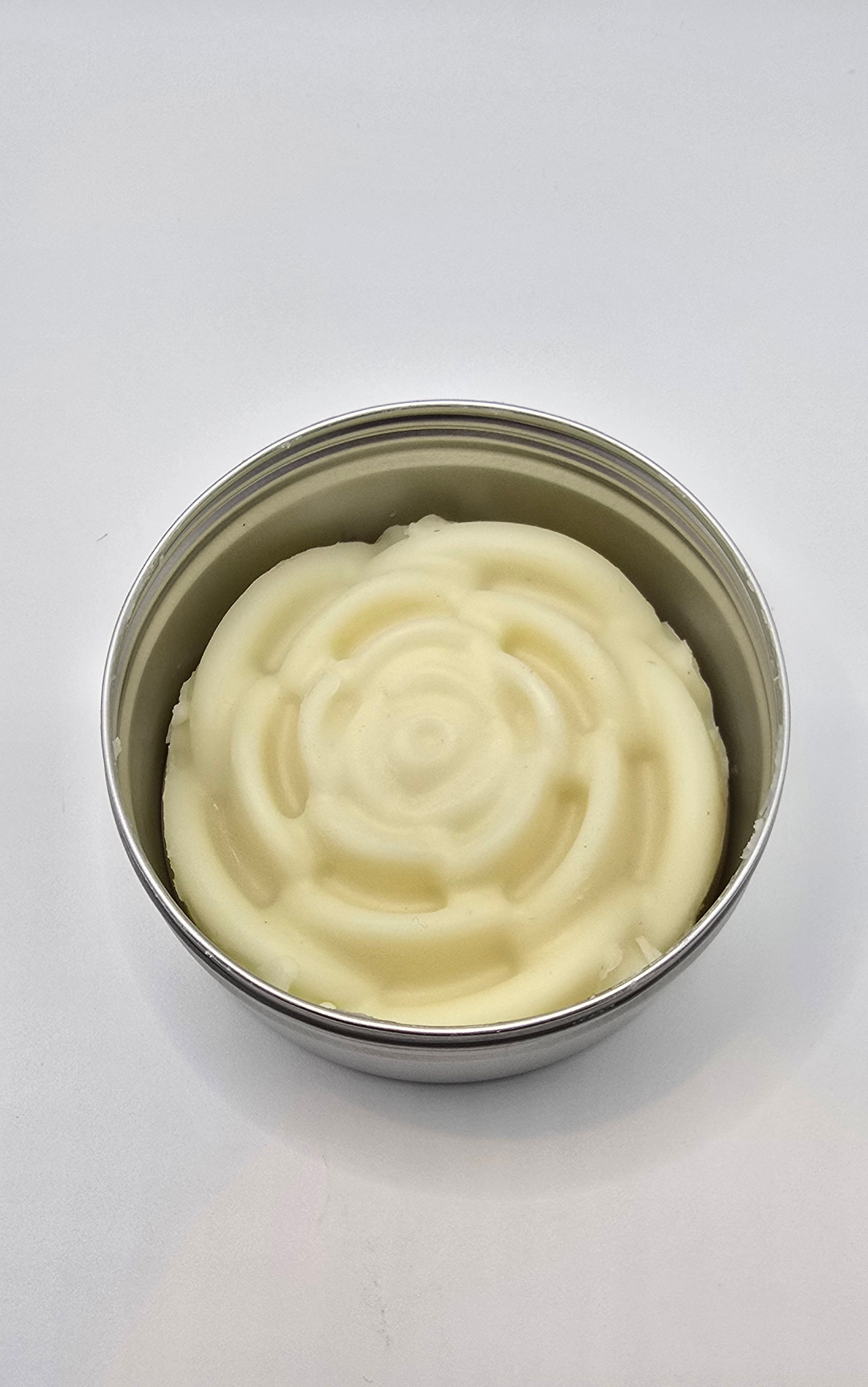 683f8647fae72e57618b2b3e_hydrating-lotion-bar-scent-coconut-rose-official-stock-photo_1751520349825.png