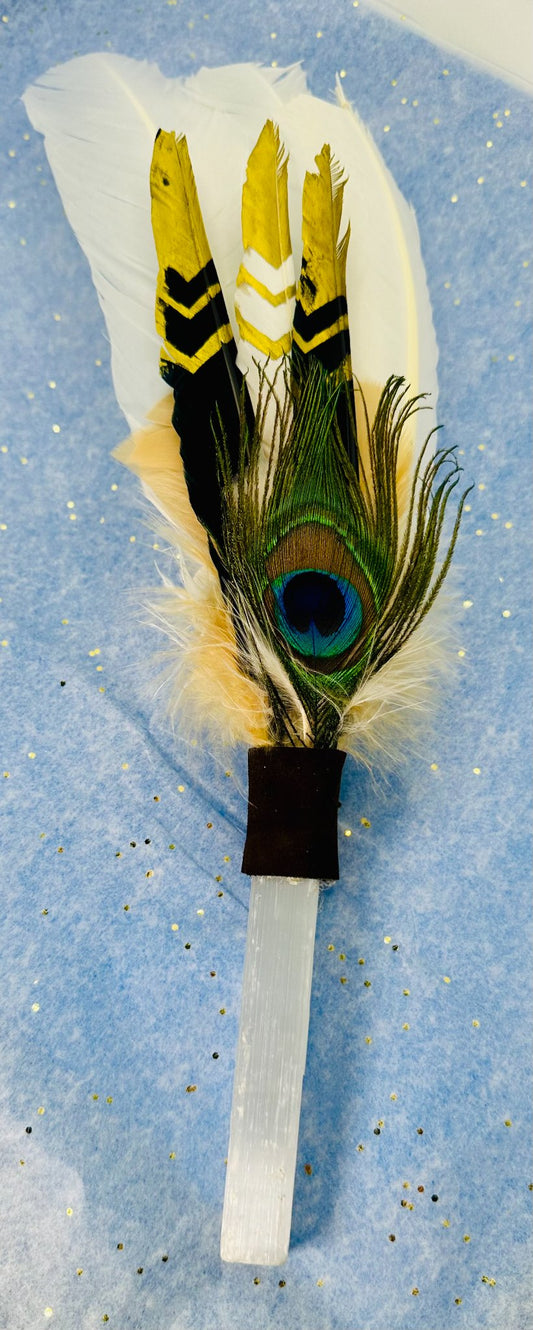 683f8647fae72e57618b2b3e_selenite-gold-and-black-smudging-feather_1751528412104.jpg